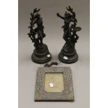 Two spelter figures and a photograph frame. The former 34 cm high.