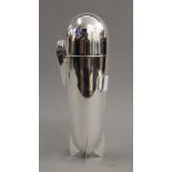 A silver plated Zeppelin cocktail shaker.