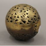 A Chinese brass ball censer. 7.5 cm high.