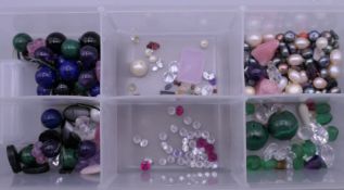 A quantity of loose beads, etc.