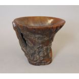 A libation cup. 12 cm high.