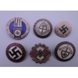 Six Nazi type badges.