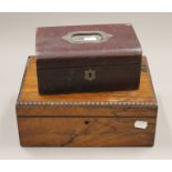 A rosewood jewellery box and a leather jewellery box. The former 28 cm wide.