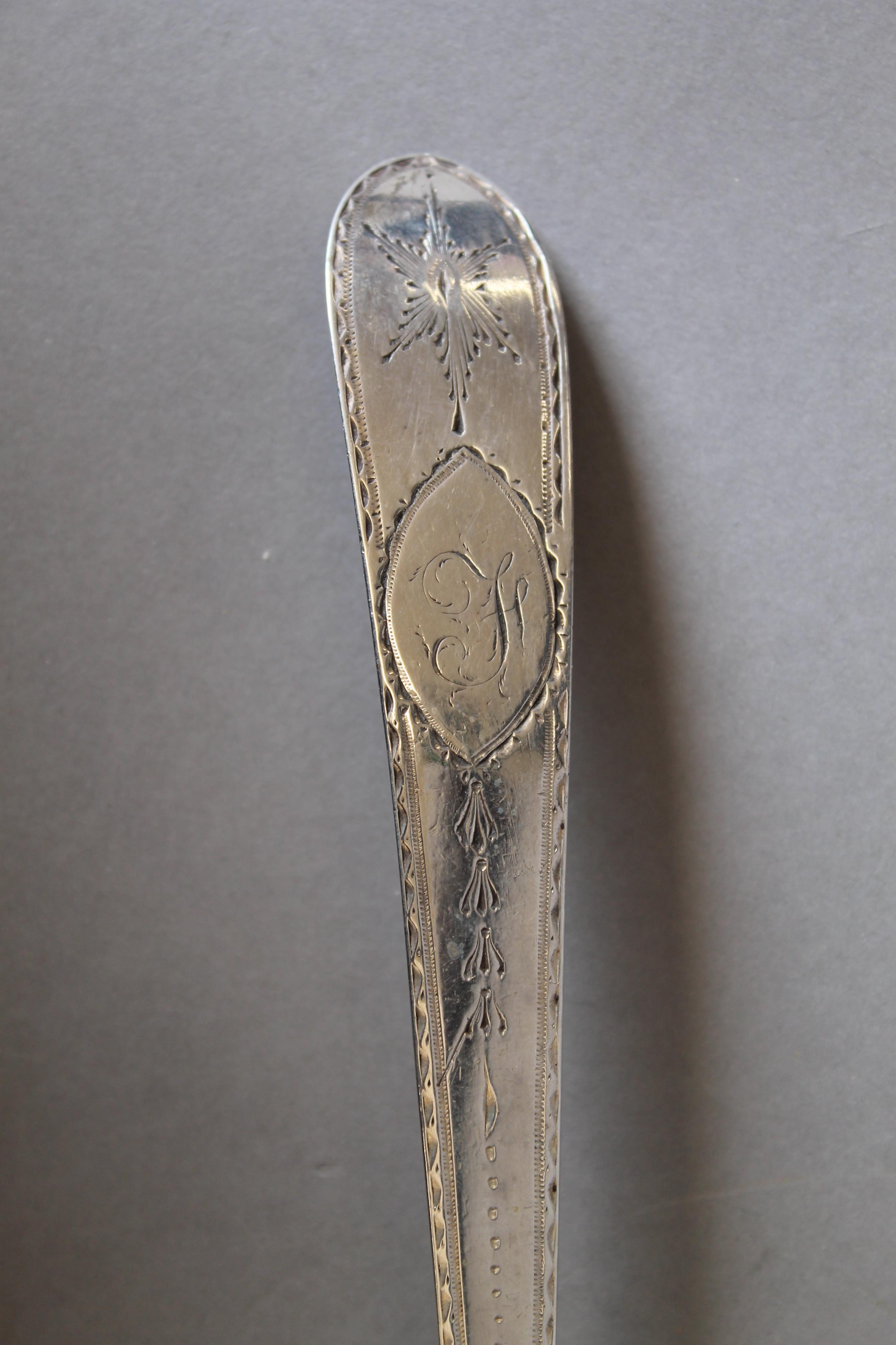 A Georgian bright cut silver ladle. 36 cm long. 158.2 grammes. - Image 2 of 3