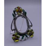 A miniature Art Nouveau style silver photograph framed. 4.5 cm high.