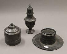 Three pieces of pewter. The largest 21 cm high.