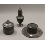 Three pieces of pewter. The largest 21 cm high.