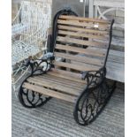 A cast iron rocking chair