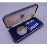A police Long Service and Good Conduct medal, boxed.
