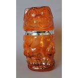 A silver plate and amber glass cookie jar formed as a dog. 25 cm high.