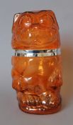 A silver plate and amber glass cookie jar formed as a dog. 25 cm high.