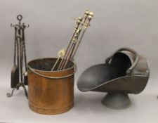 A copper coal scuttle, log bin and two companion sets.