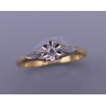 An 18 ct gold diamond solitaire ring. Ring size P.