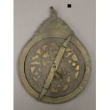 A Chinese brass dial.