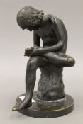 After The Antique, bronze figure of a boy extracting a thorn from his foot. 18 cm high.