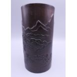 A late 19th/early 20th century Chinese carved bamboo brush pot. 15.25 cm high.