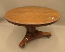 A Victorian mahogany tilt top breakfast table. 115 cm diameter.