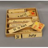 A quantity of wooden child's educational slides/teaching aids.