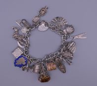 A silver charm bracelet. 76.1 grammes.