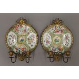 A pair of 19th century Canton plates mounted as girandoles. Each 34 cm high.