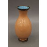 A pink ground cloisonne vase. 25 cm high.