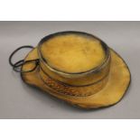 A leather hat. Marked XL - approximate size 7 1/8.