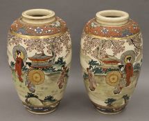 A pair of Satsuma vases. 31.5 cm high.