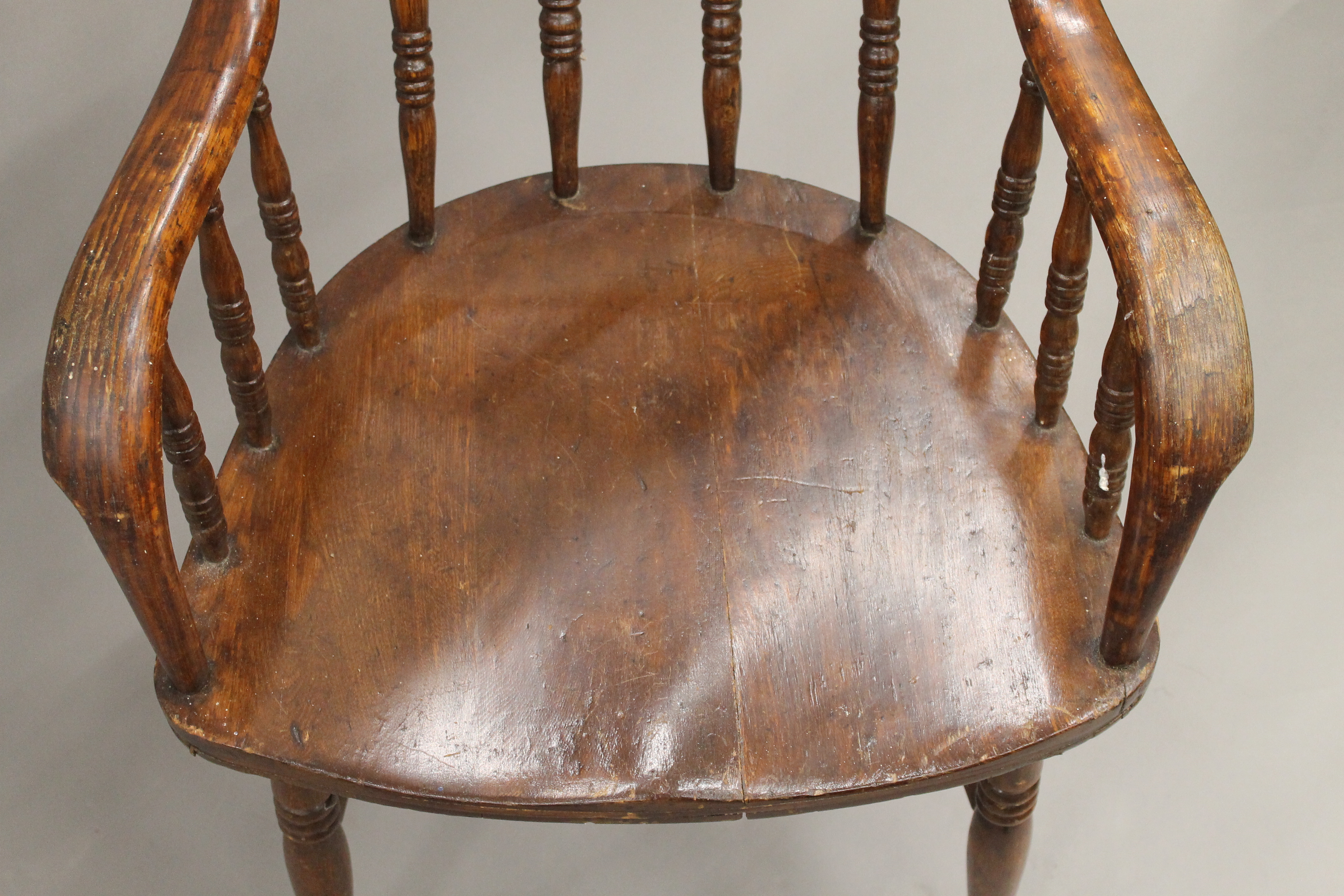 A Victorian elm seated stick back armchair and another. - Image 5 of 11