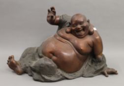 A large bronze model of Buddha. 38 cm high.