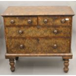 An 18th century and later oyster veneered chest of drawers. 97 cm wide.