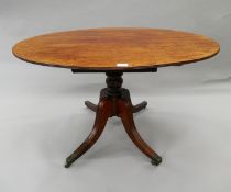 A 19th century mahogany tilt top breakfast table. 126.5 cm long.