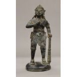 An Eastern bronze model of a warrior. 25 cm high.