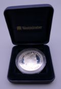 A 1998 silver proof coin, cased.