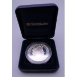 A 1998 silver proof coin, cased.