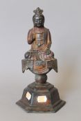 A bronze model of Buddha. 27.5 cm high.