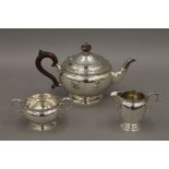 A composite silver three-piece tea set.