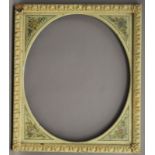 A Continental painted frame with oval mount. 58 x 67.5 cm.