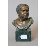 A bronze model of a classical bust. 14 cm high.