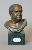 A bronze model of a classical bust. 14 cm high.