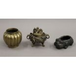 Three Chinese bronze censers. The largest 9.5 cm high.