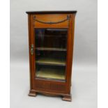 An Edwardian music cabinet. 47 cm wide.