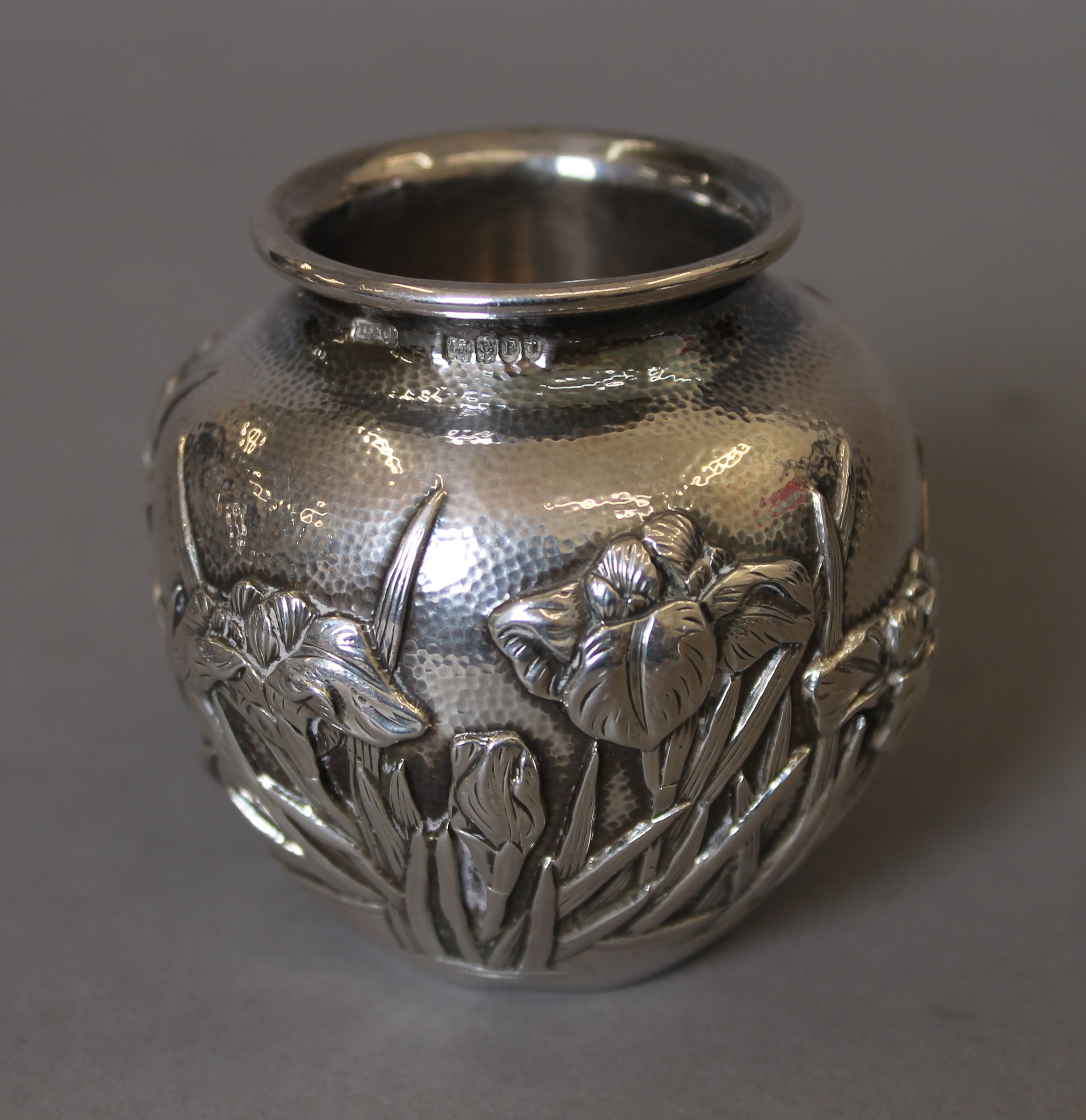 A pair of Japanese embossed silver vases, with Liberty & Co import marks. Each 6.5 cm high. 247. - Image 2 of 5