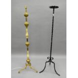 An onyx mounted standard lamp and a candle stand. Each approximately 136 cm high.