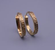 A pair of 9 ct gold hoop earrings. 2.5 cm high. 1.8 grammes.