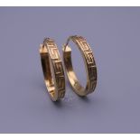 A pair of 9 ct gold hoop earrings. 2.5 cm high. 1.8 grammes.