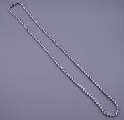 A Riviera necklace in white metal. 84 cm long.
