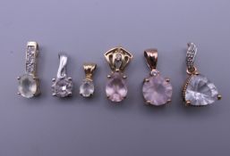 A quantity of 9 ct gold stone set pendants, some marked and some unmarked.