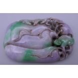 A large carved lavender jade pendant. 9.5 cm high.