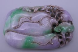 A large carved lavender jade pendant. 9.5 cm high.