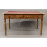 A Victorian pine partners writing table. 135 cm long.